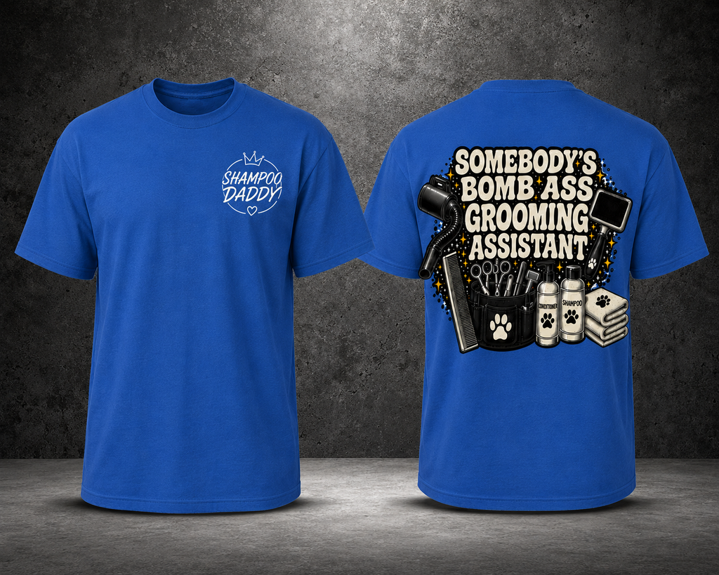 SOMEBODY'S BOMB ASS GROOMING ASSISTANT T-SHIRT